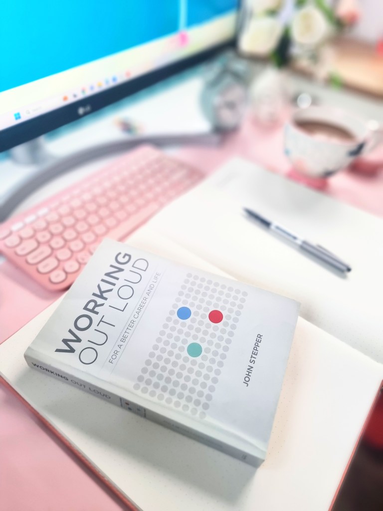 A close-up of the book cover of the book 'Working out loud' by John Stepper